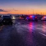 Arizona highway at dusk showing emergency vehicles at the scene of a drunk driving crash Arizona highway at dusk showing emergency vehicles at the scene of a drunk driving crash