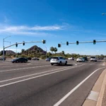 How long does an injury settlement take in Arizona, Phoenix metro intersection with traffic signals and open desert sky How long does an injury settlement take in Arizona, Phoenix metro intersection with traffic signals and open desert sky