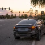 Empty Glendale intersection at dusk showing how uninsured motorist coverage pays for a phantom vehicle or no contact hit and run Empty Glendale intersection at dusk showing how uninsured motorist coverage pays for a phantom vehicle or no contact hit and run